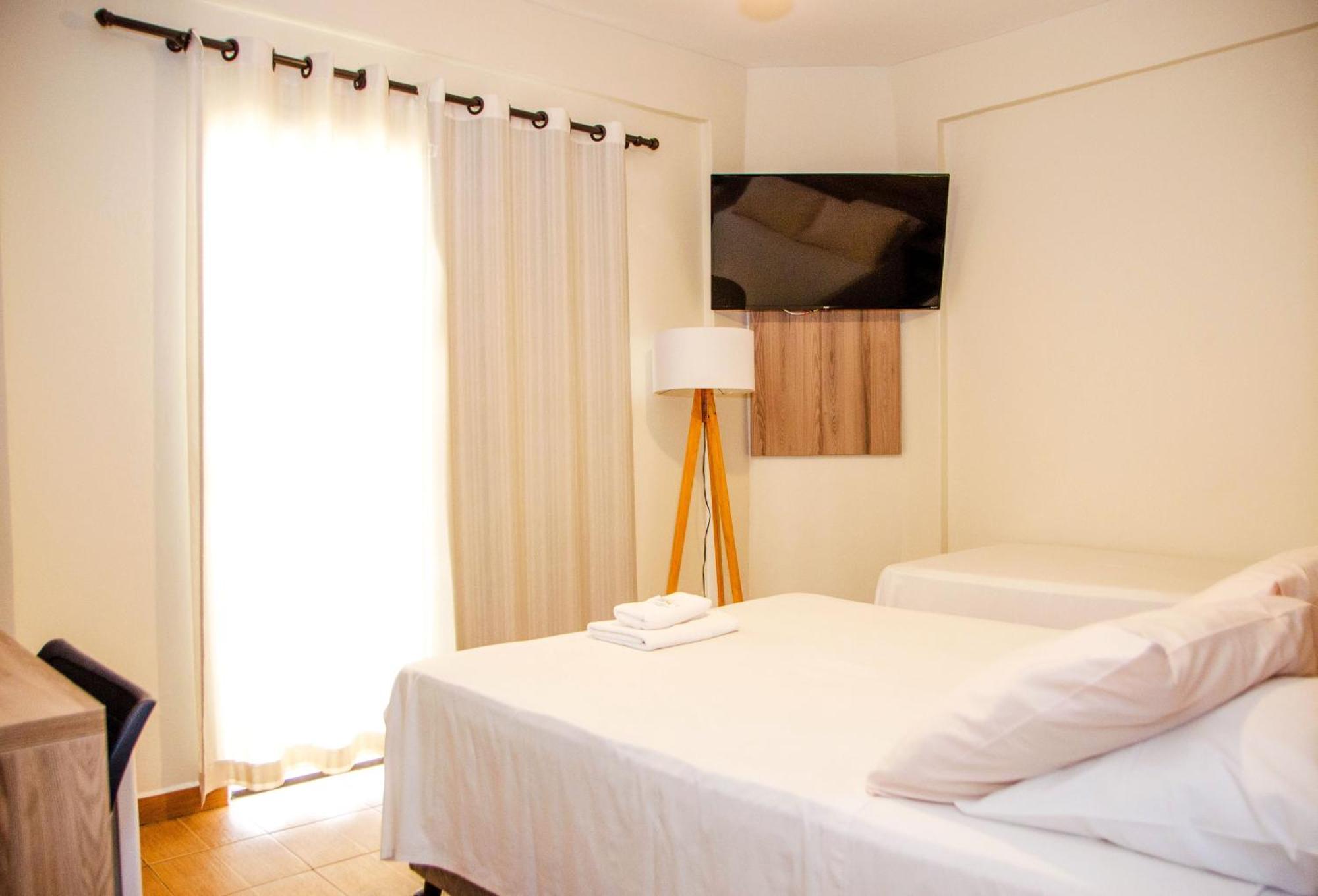 Hotel Ze Maria Pouso Alegre Bagian luar foto
